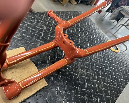 We have begun adding the pin striping to the frame.